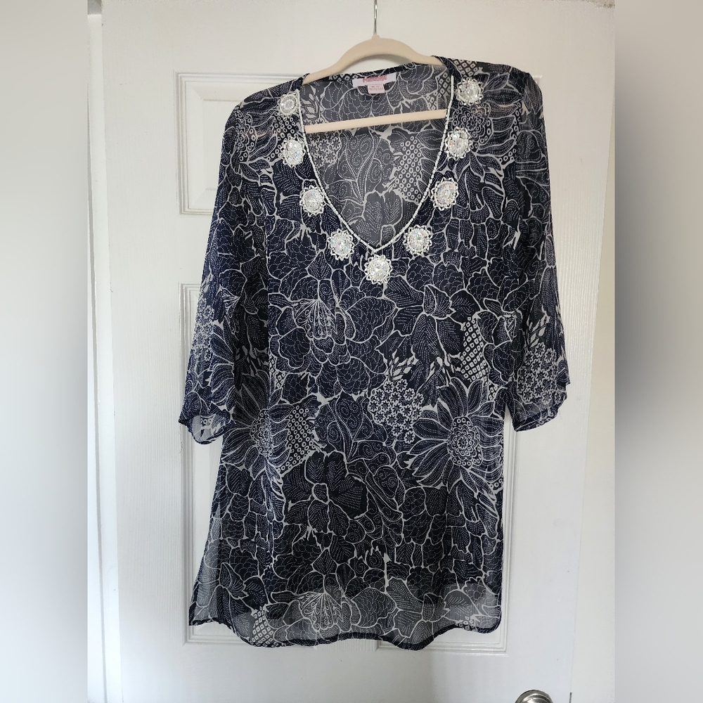 Sheer beaded beach cover